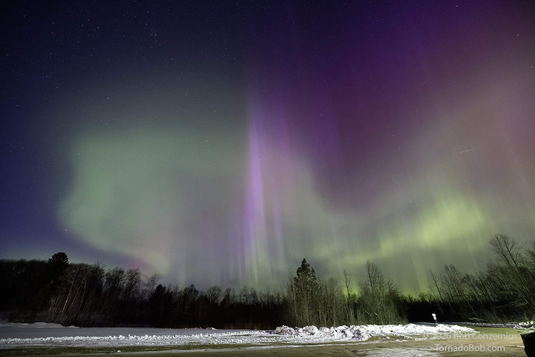 A multi-colored substorm begins at Mt Itasca