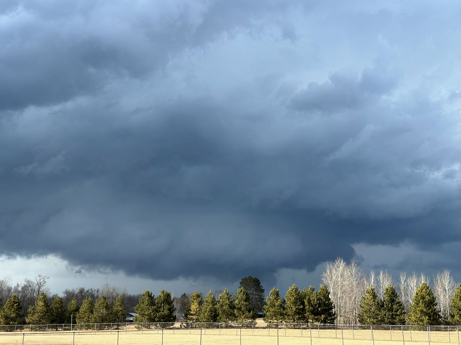 DESCRIBE THE PHOTO — storm type, location, date.